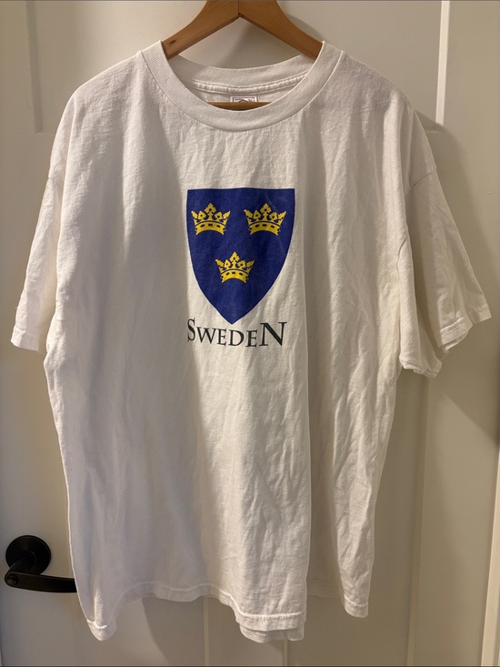 Delta Other - Sweden White Tee with Blue Shield & Yellow Crowns